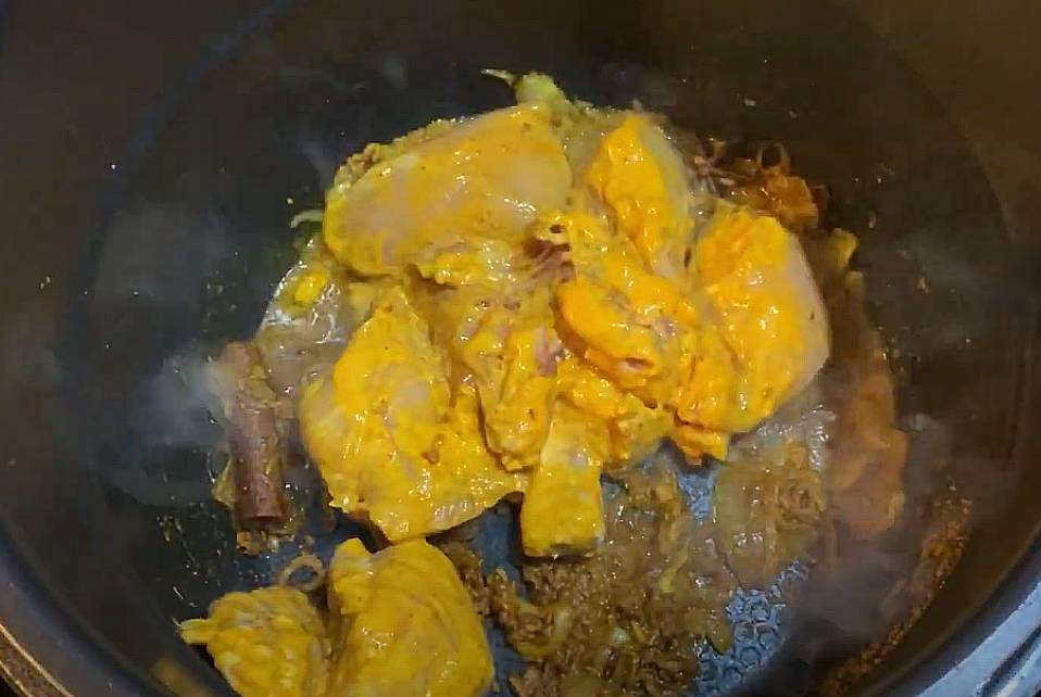 Add in marinated chicken