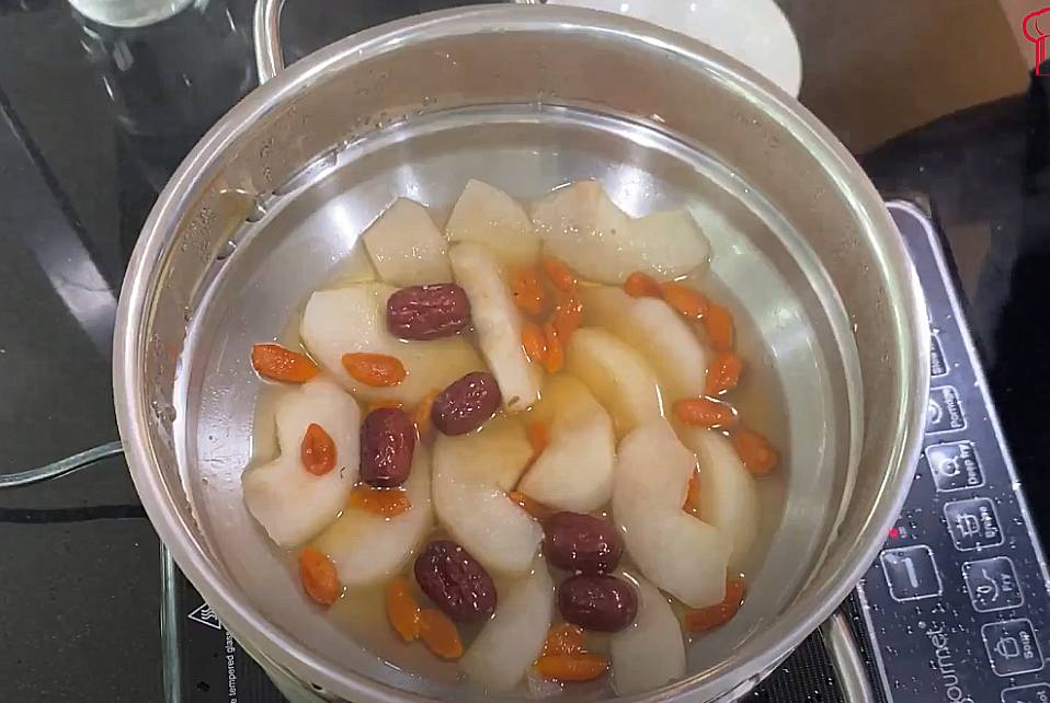 poached pear done boiling