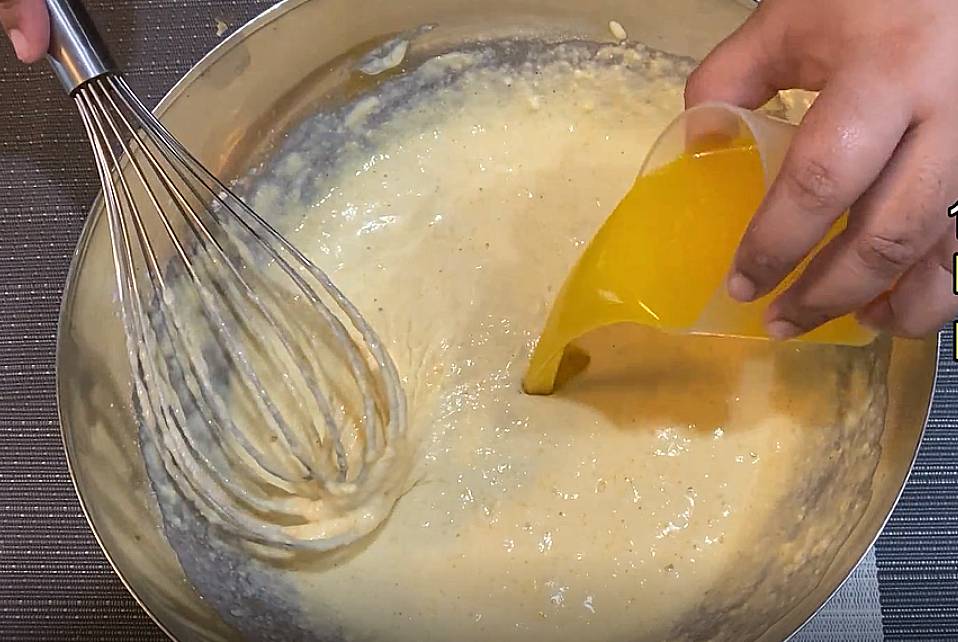 pour melted butter into the batter