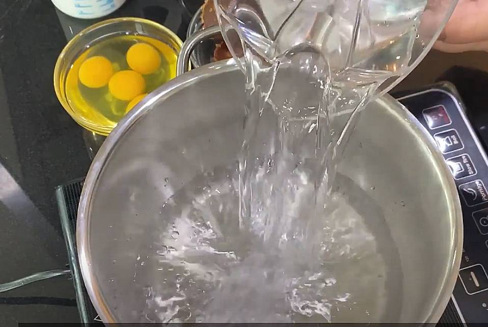 pour water into the double boiler