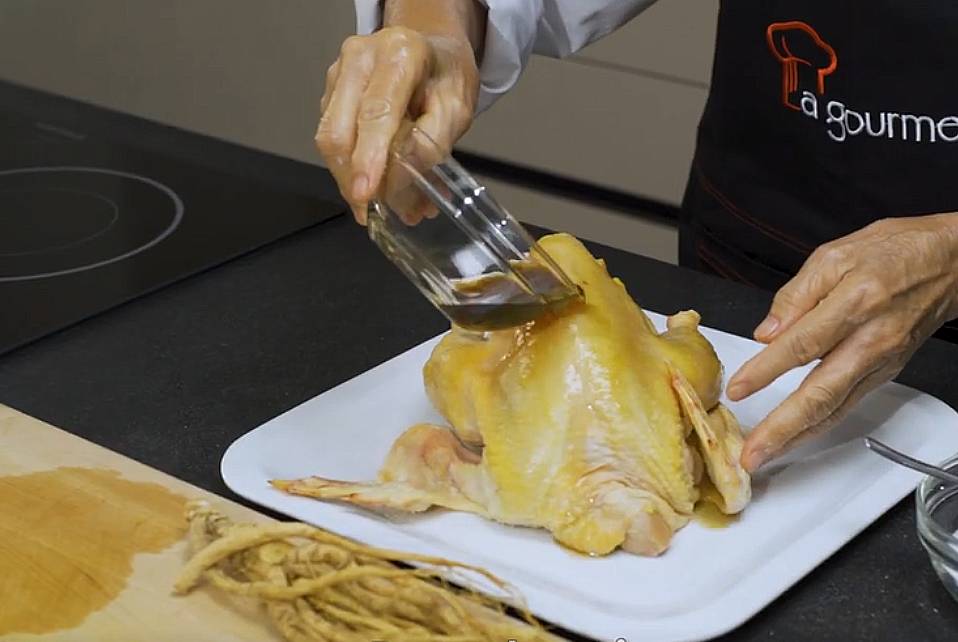 pour cooking wine onto the chicken