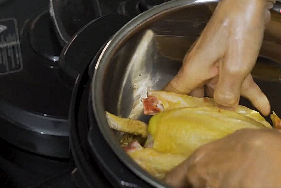 put chicken into the inner pot of the pressure cooker