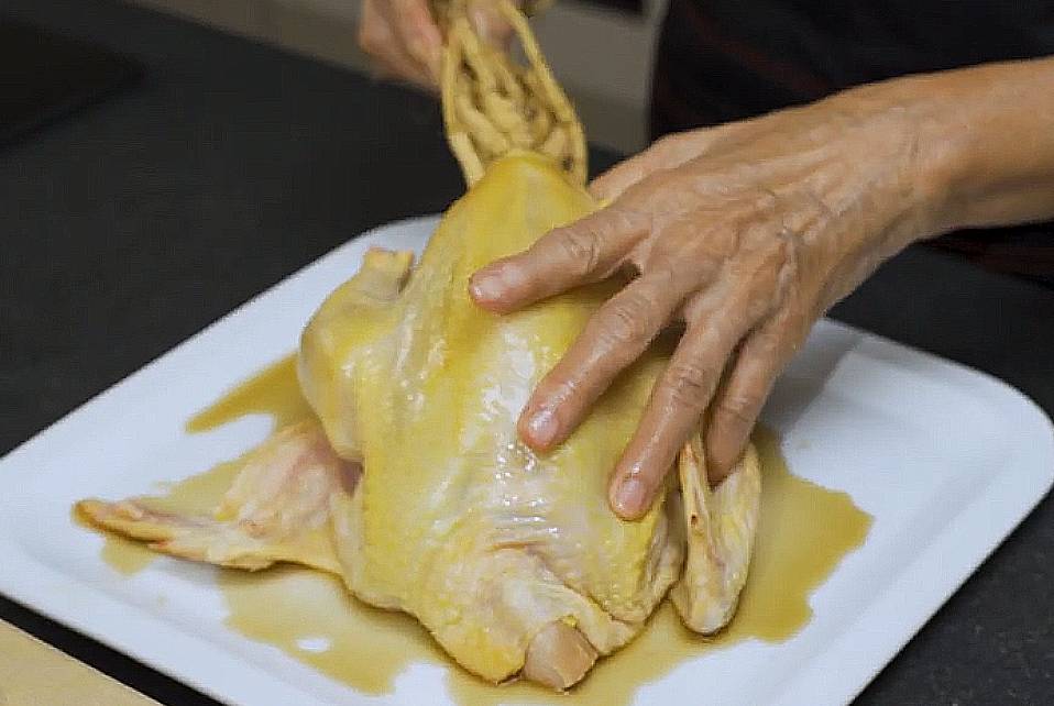 stuff the ginseng into the chicken cavity