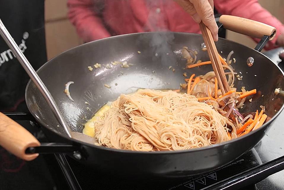 add in vermicelli noodles and stir fry